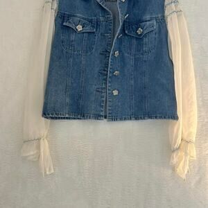 Stefano International denim vest with sheer sleeves and lace trim. Size: L